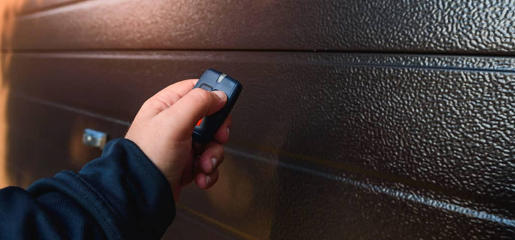 automatic door opener with remote control in Sun Village